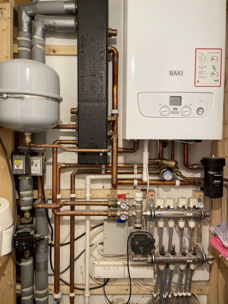 New boiler, low loss header, additional expansion vessel and underfloor heating pipework : Swipe To View More Images