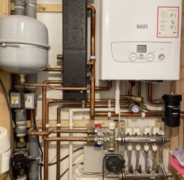 New boiler, low loss header, additional expansion vessel and underfloor heating pipework : Click Here To View Larger Image